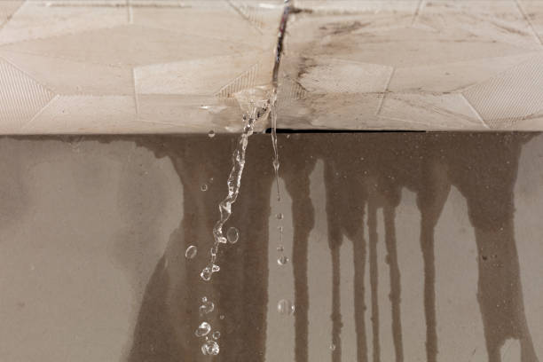 Professional Flood Damage Cleanup technician working in Berea, KY